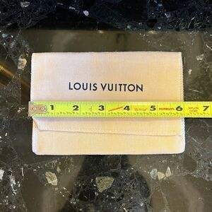 Authentic Louis Vuitton pouch.